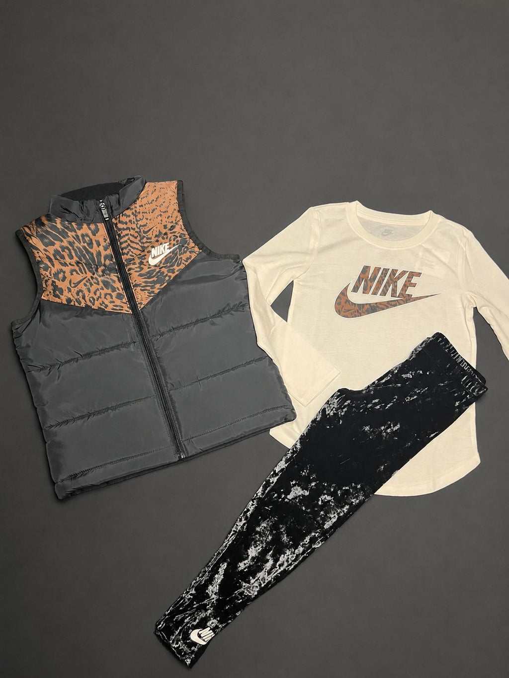 Girls Nike leopard print 3 piece set with padded gilet, long sleeve T-shirt and black leggings, brand new with tags.