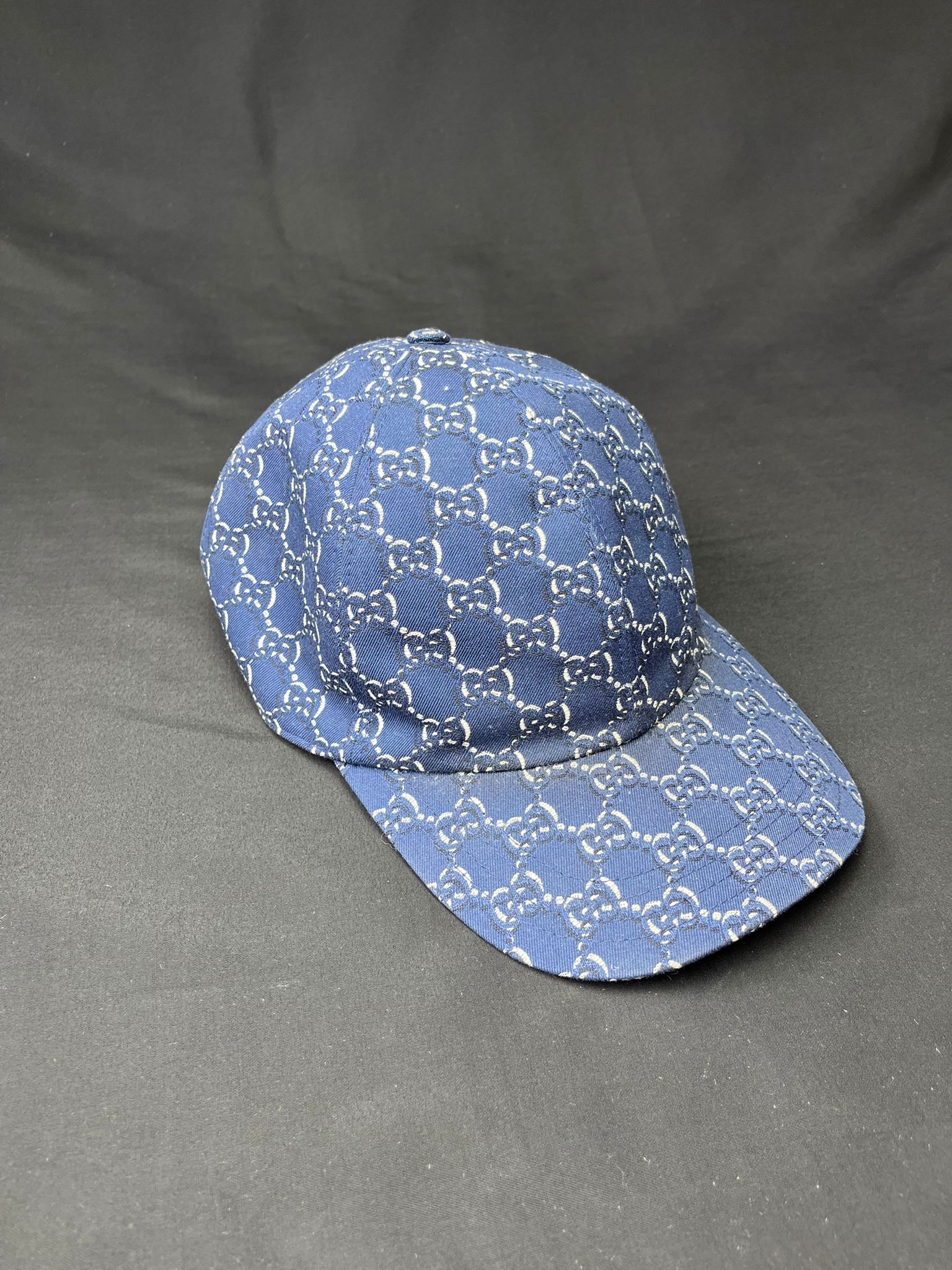 Authentic Gucci blue GG monogram cap with adjustable strap, size Large 59cm, pre-owned in very good condition.