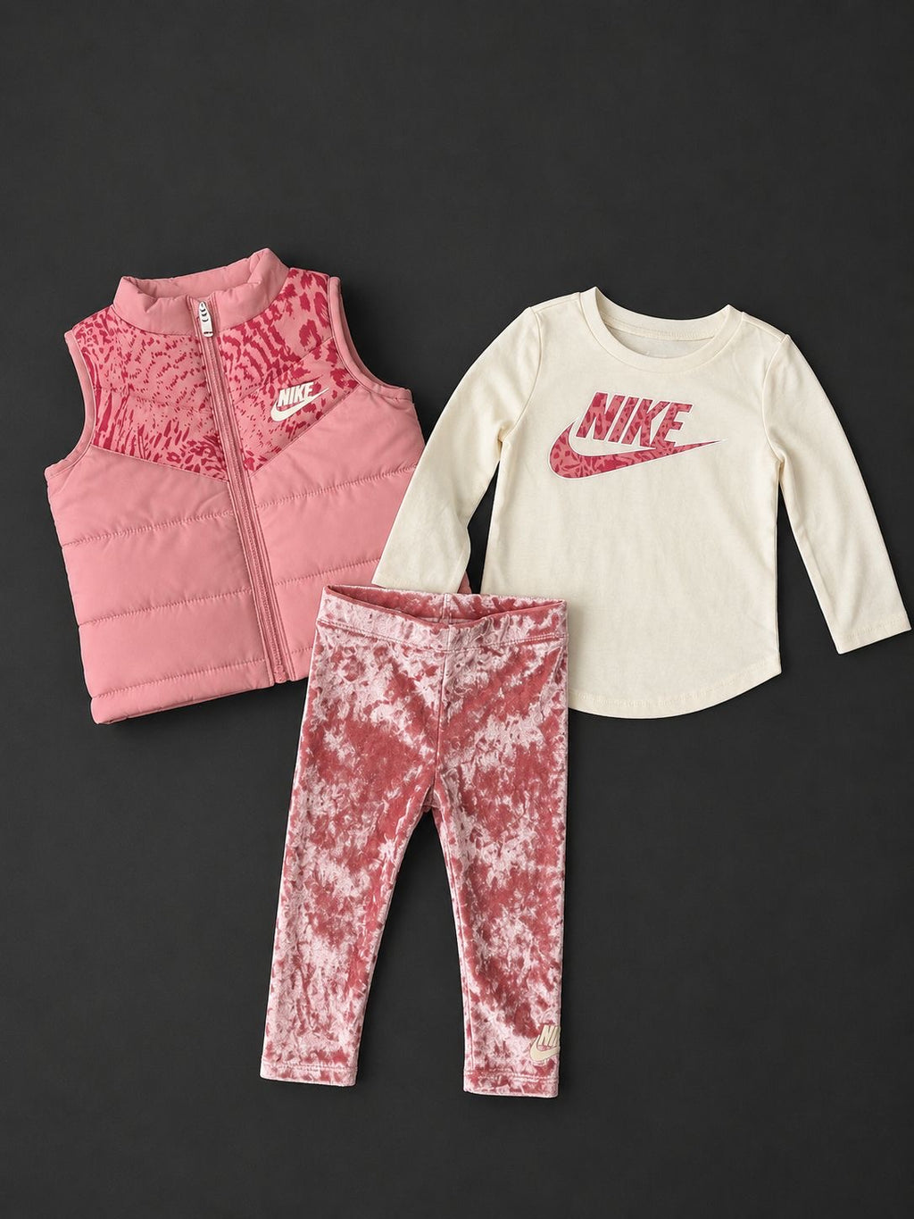 Girls Nike Pink 3 Piece Set with padded gilet, long sleeve t-shirt and matching leggings, brand new with tags.