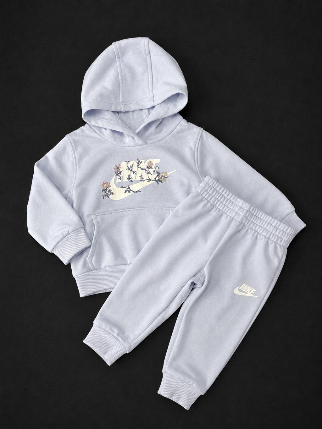 Infant Nike Light Lilac and Ice Blue floral tracksuit with matching hoodie and joggers, brand new with tags.