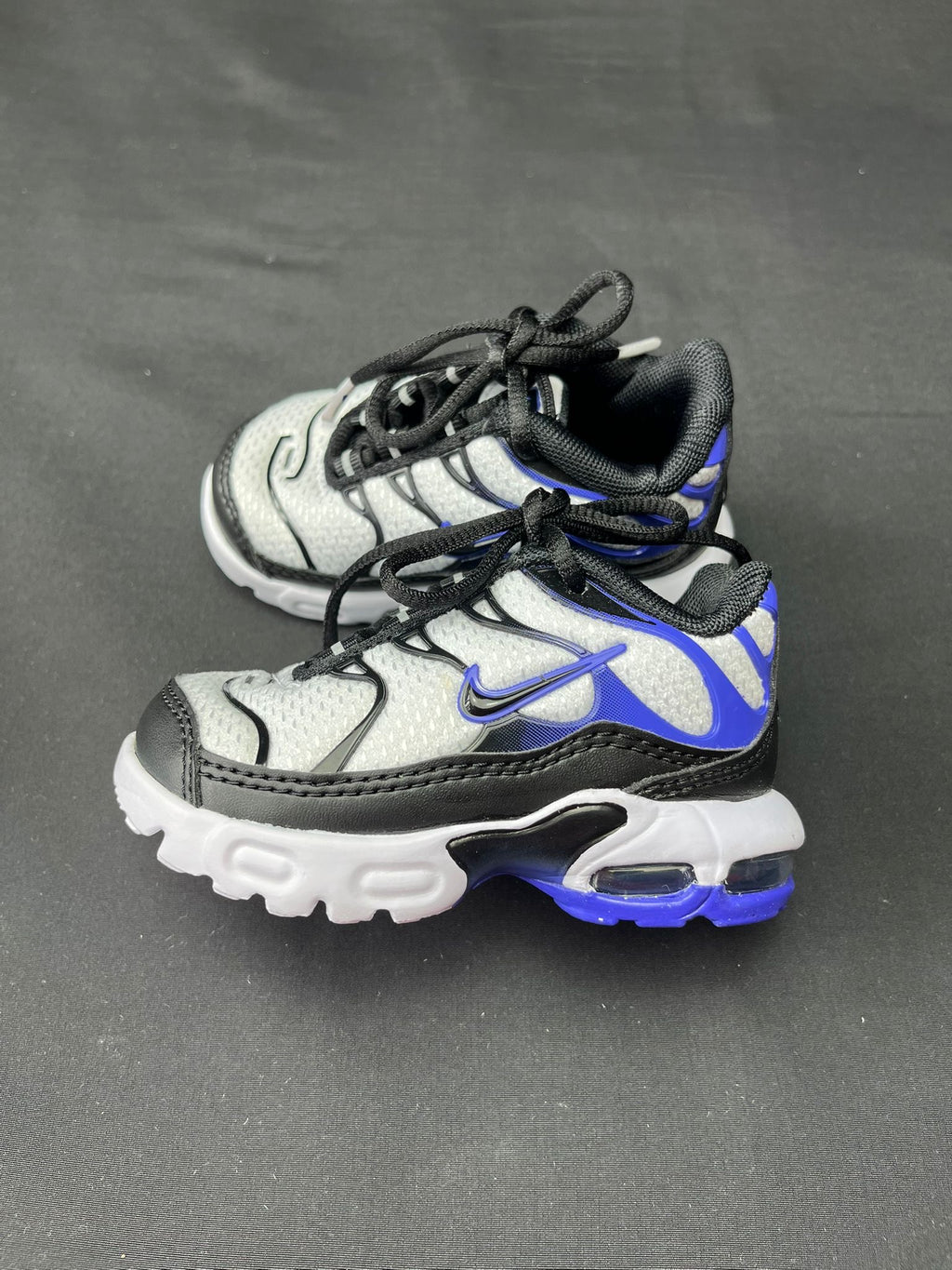 Authentic Infant Nike TN trainers in White, Black and Royal Blue, brand new in the original box.