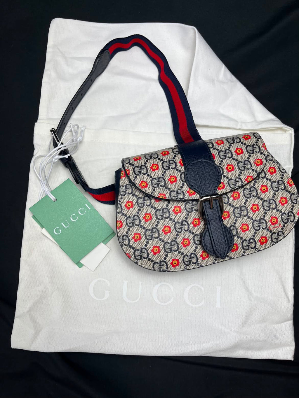 Kids Gucci GG Supreme Floral Belt Bag in GG canvas with floral print. Brand new with dust bag.