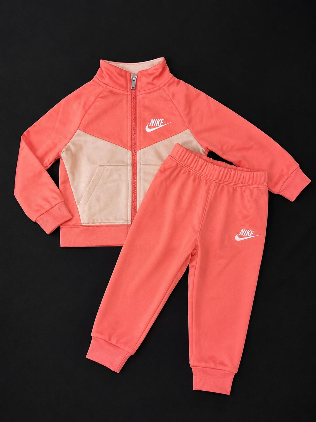 Kids Nike Coral and Beige Tracksuit with full zip jacket and matching joggers, brand new with tags.