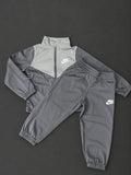 Kids Nike Grey Tracksuit with full zip jacket and matching cuffed joggers, brand new with tags.