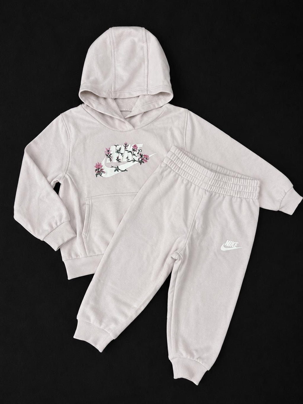Kids Nike Very Light Blush Pink floral tracksuit with matching hoodie and joggers, brand new with tags.