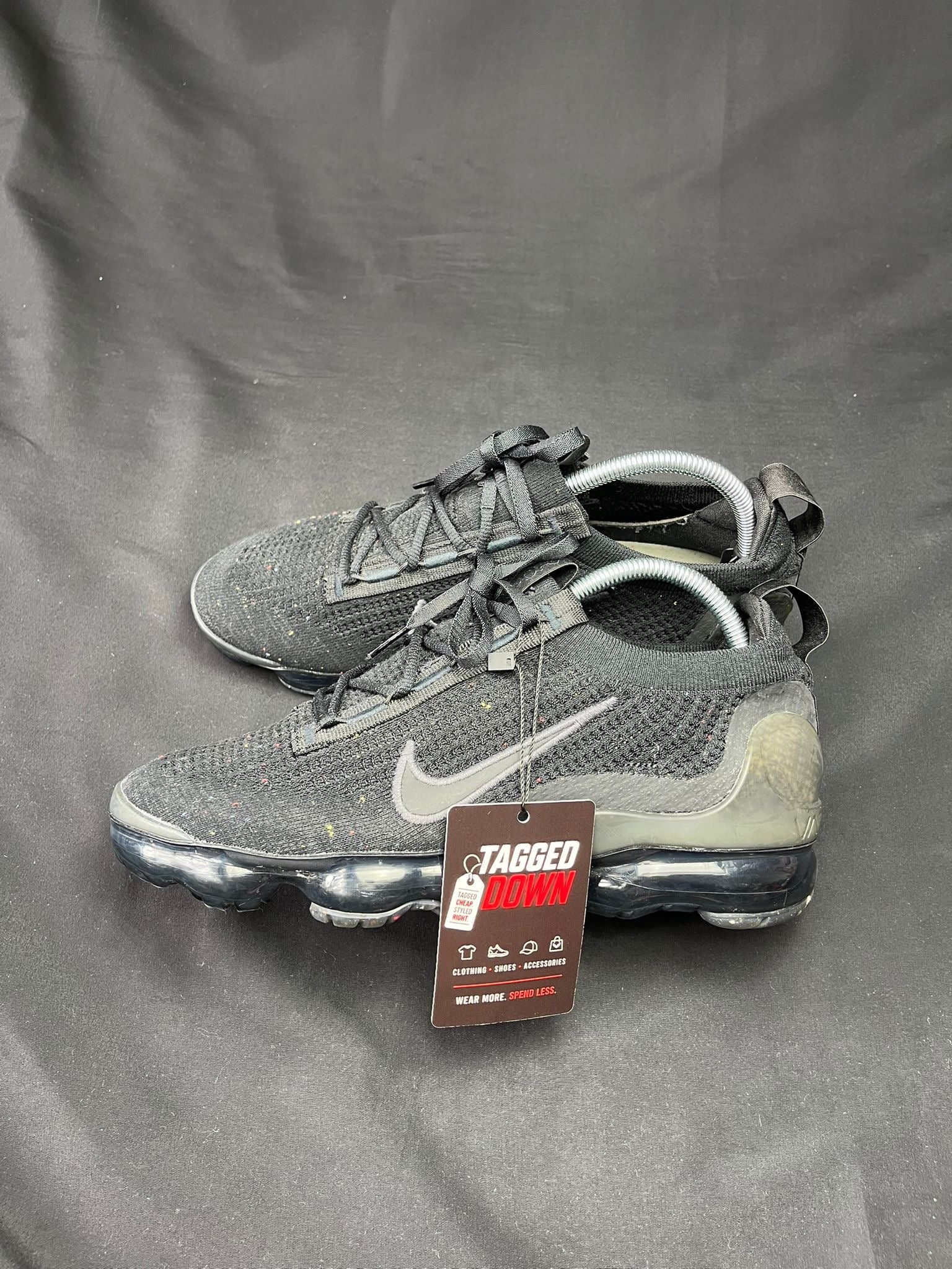 Authentic Nike Air Vapormax Flyknit Triple Black trainers, pre-owned in excellent condition with full-length Vapormax Air cushioning.