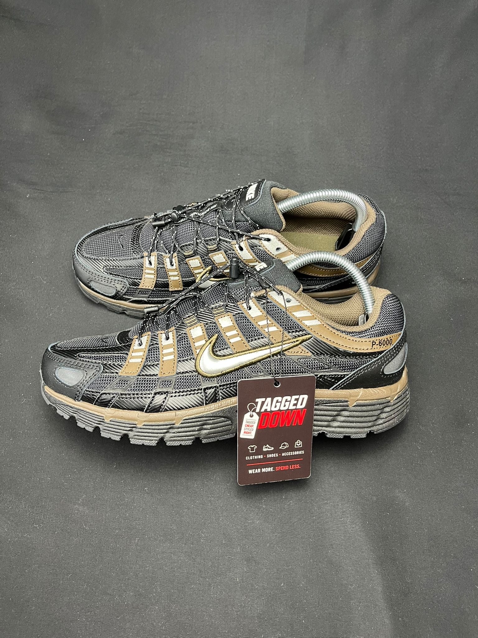 Authentic Nike P-6000 Black and Bronze trainers, brand new in the original box.