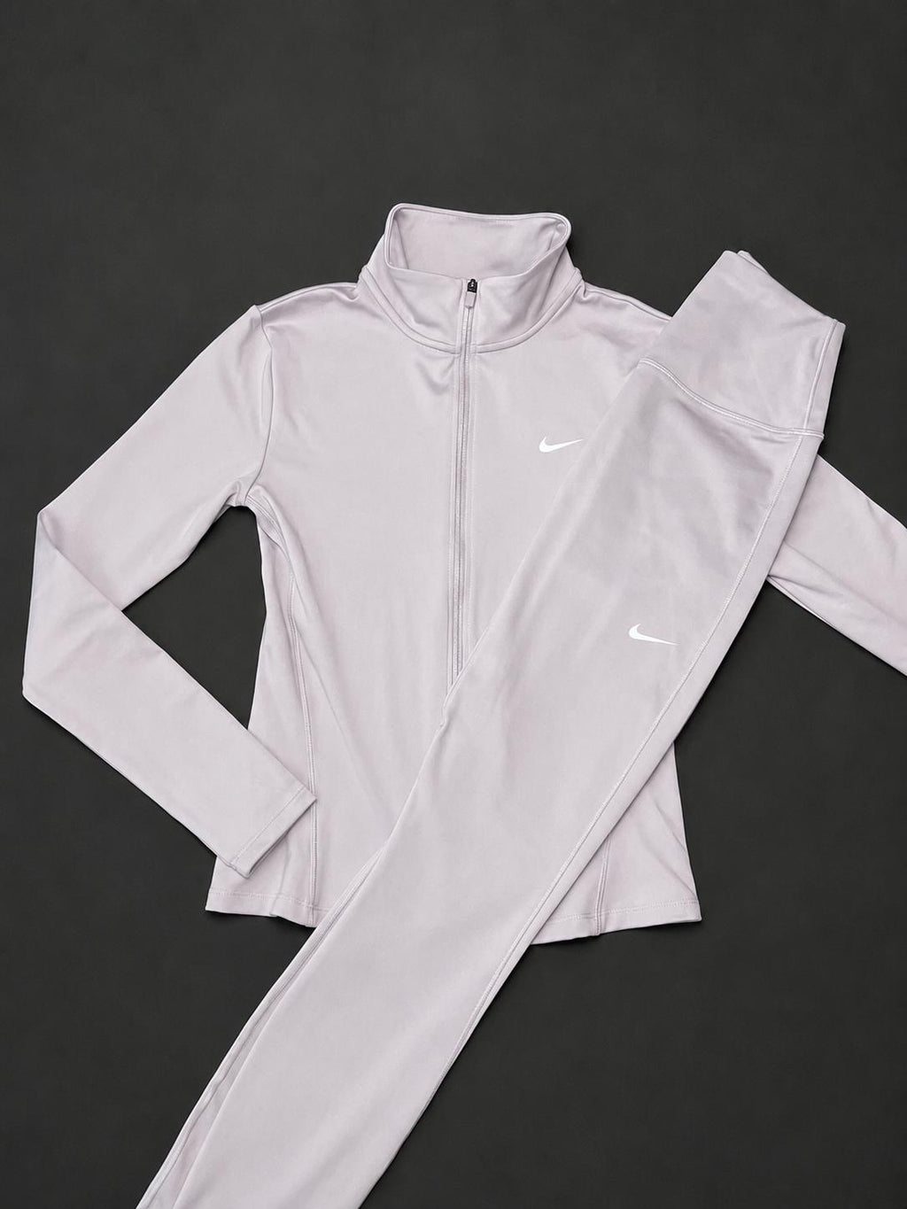 Nike Women’s Light Lilac Jacket and Leggings Set, brand new with tags.
