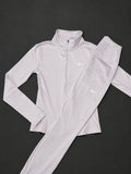 Nike Women’s Light Lilac Jacket and Leggings Set, brand new with tags.