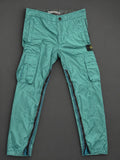 Authentic Stone Island Nylon Metal Turquoise cargo pants with removable Compass badge and full-length leg zips, brand new without tags.