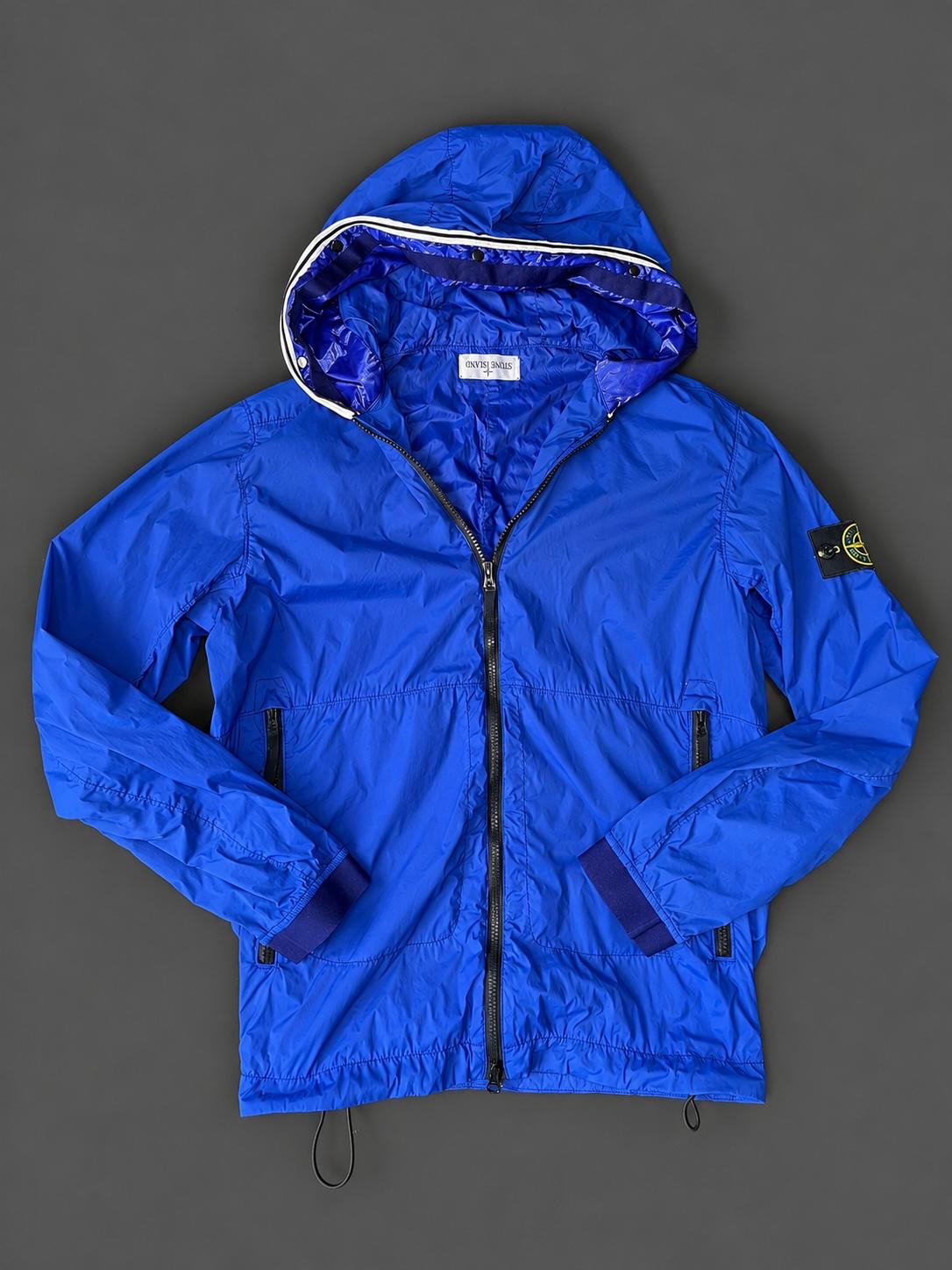 Authentic Stone Island Royal Blue hooded jacket with removable Compass badge, pre-owned in excellent condition.