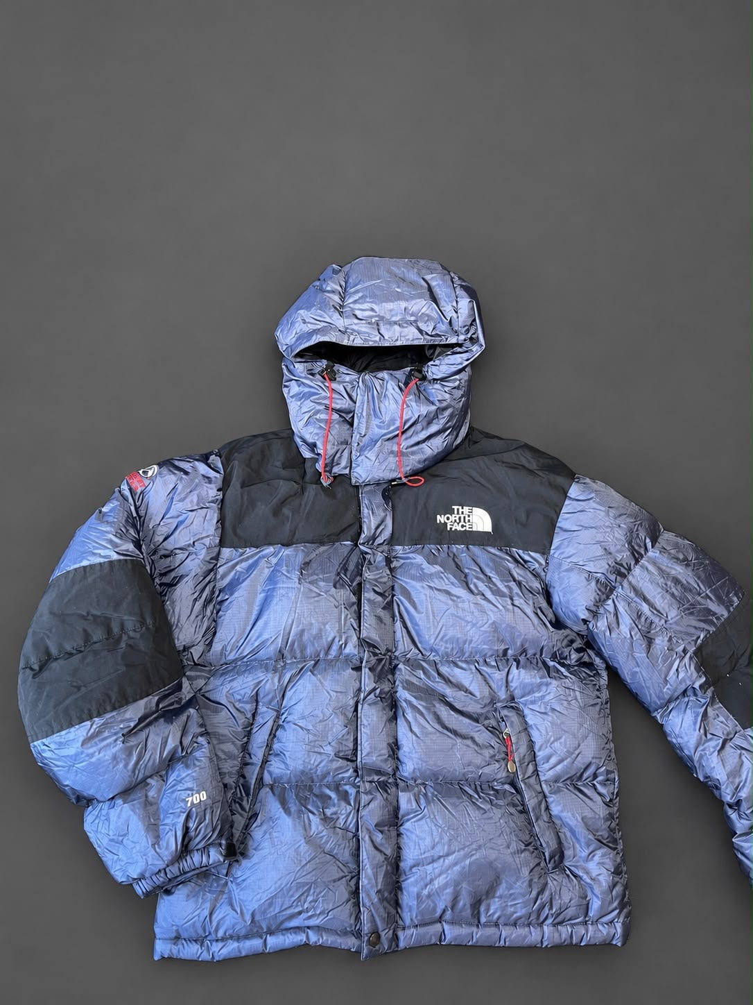 Authentic The North Face Himalayan 700 blue down jacket, pre-owned in excellent condition with 700-fill insulation.