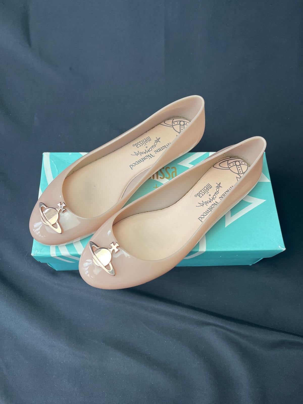 Vivienne Westwood x Melissa nude Orb sandals, UK size 7, pre-owned in good condition with general wear.